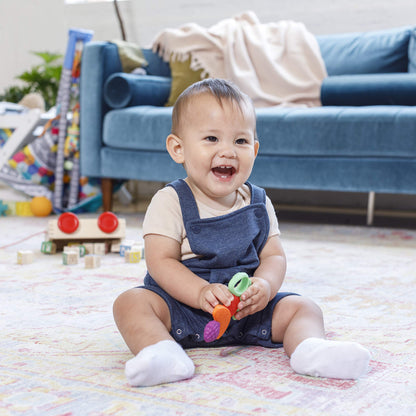 Infantino Lil' Nibbles Textured Silicone Baby Teether - Sensory Exploration and Teething Relief with Easy to Hold Handles, Orange Carrot, 0+ Months